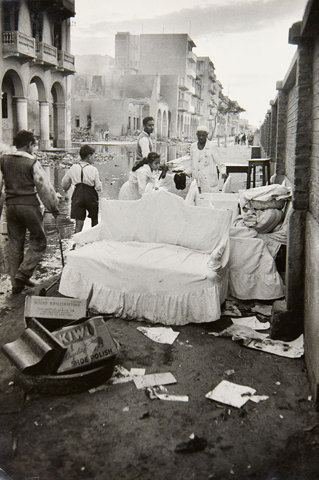 DAVID SEYMOUR (1911–1956) After the bombing on Port Saïd, Egypt 1956 Gelatin silver print, printed in the 1960s 29,7 × 19,8 cm (11.7 × 7.8 in) Photographer’s agency stamp on the reverse